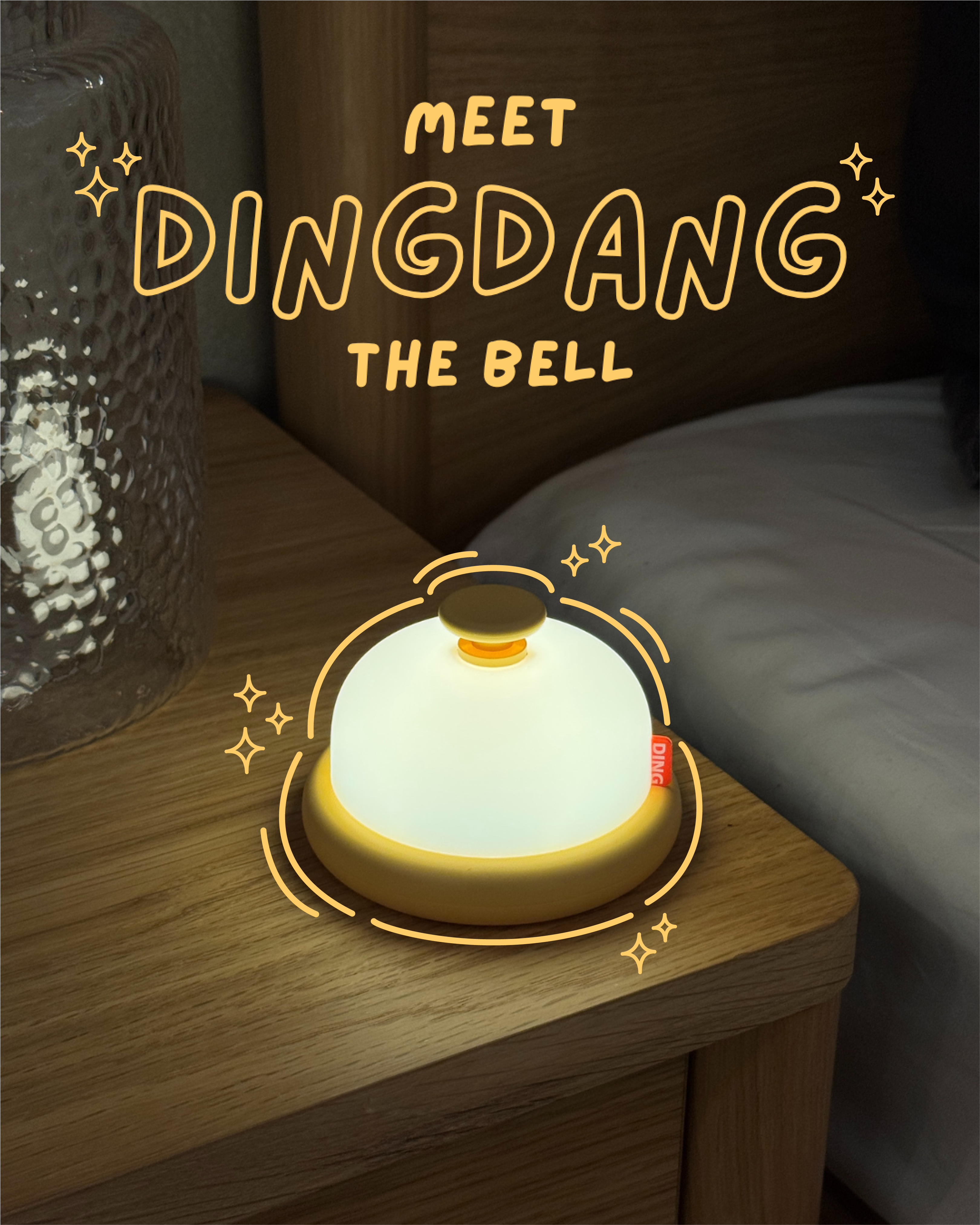Glowing bell-shaped night light on a wooden surface with 'Meet Dingdang the Bell' text.