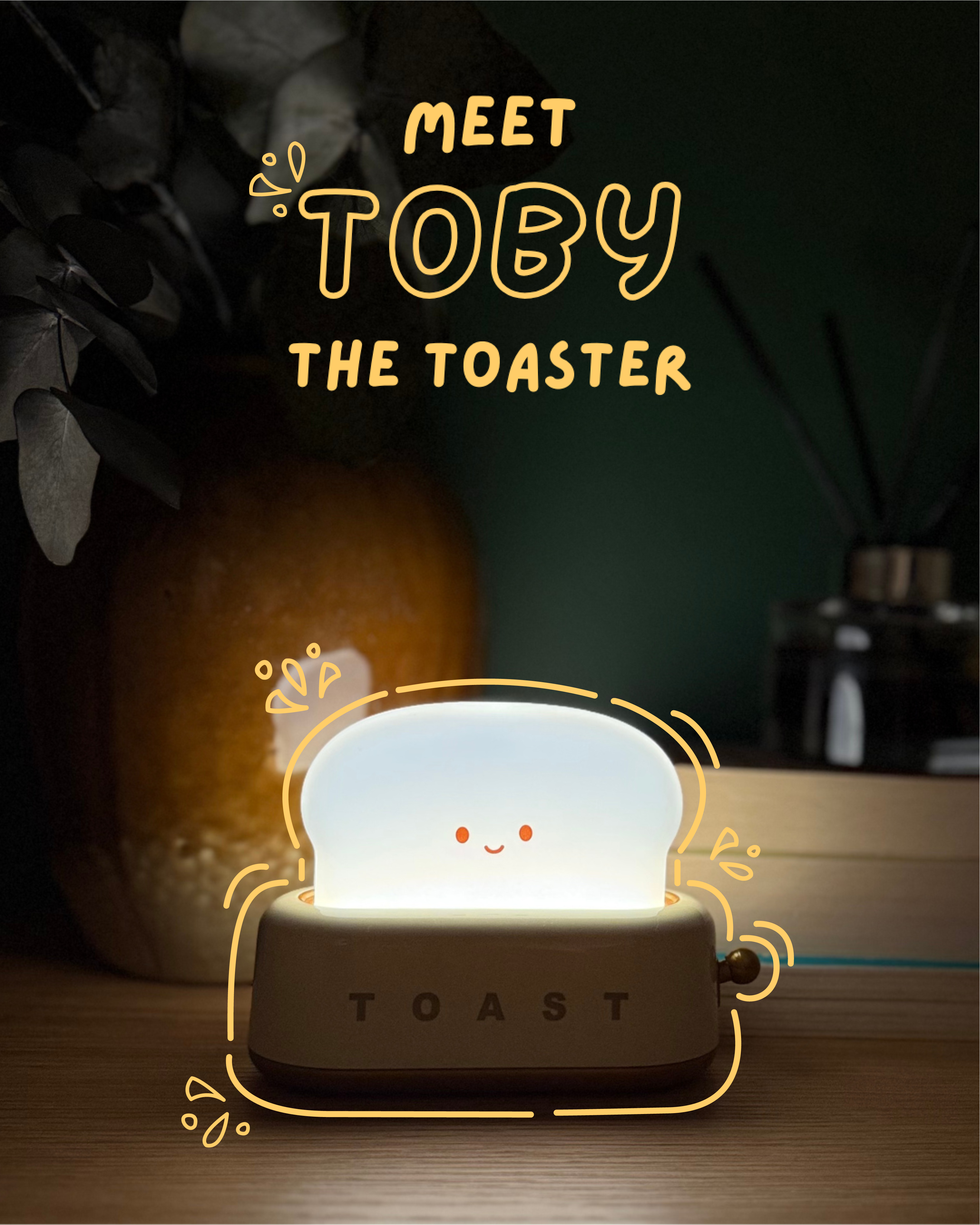 Light-up toaster shaped night light with 'Meet Toby the Toaster' text on a dark background.