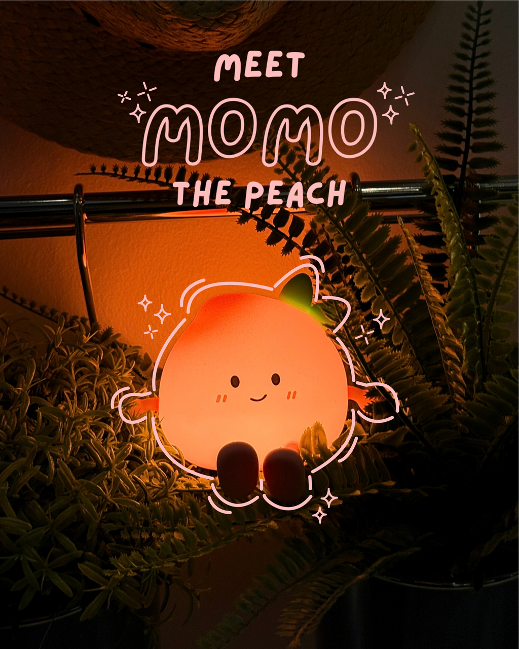 Neon sign of a peach character with 'Meet Momo the Peach' text, surrounded by plants.